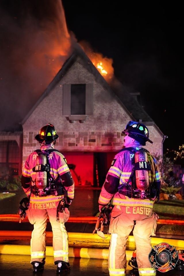 FF in front of house fire